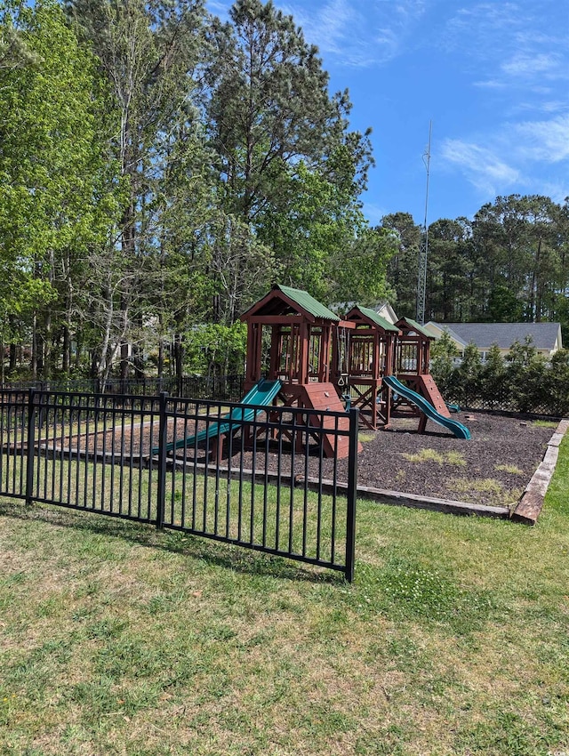community playground with view of wooded area