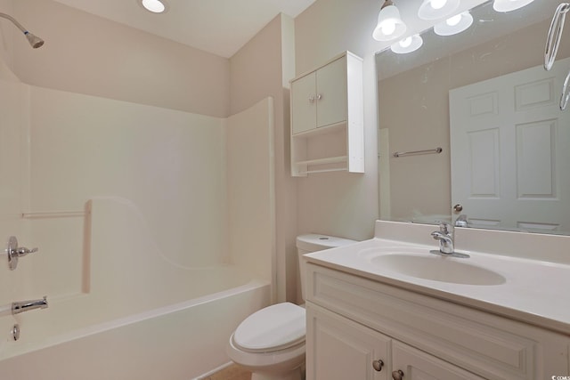 full bath with toilet, bathtub / shower combination, and vanity