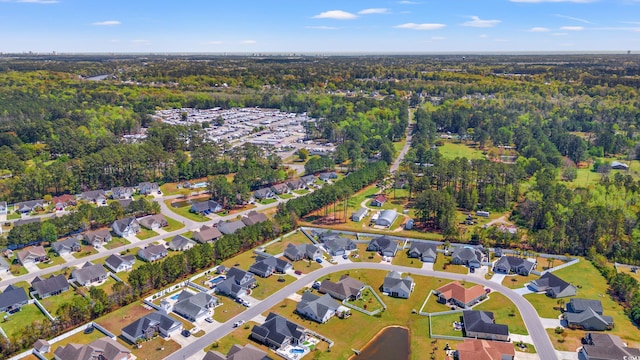bird's eye view with a view of trees and a residential view