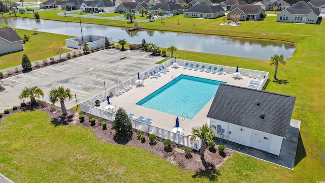 bird's eye view with a water view and a residential view