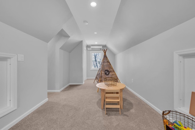 game room with carpet floors, recessed lighting, baseboards, a wall unit AC, and lofted ceiling