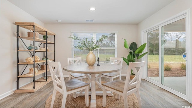 4481 E Coast Ln, Shallotte, NC 28470 - dining room featuring light wood finished floors and recessed lighting