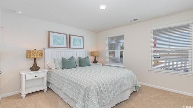 4481 E Coast Ln, Shallotte, NC 28470 - bedroom featuring light colored carpet