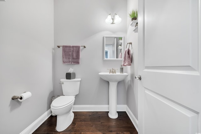 1478 Suncrest Dr, Myrtle Beach, SC 29577 - bathroom featuring toilet, wood finished floors, baseboards, and a sink