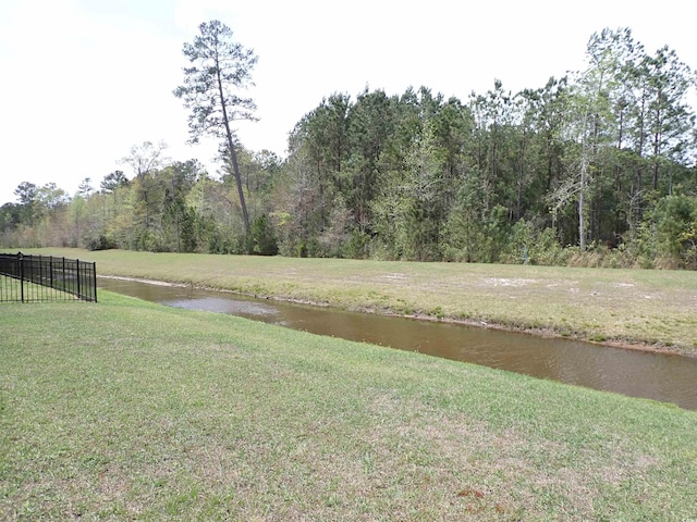 447 Archer Ct, Conway, SC 29526 - view of yard with a water view and fence