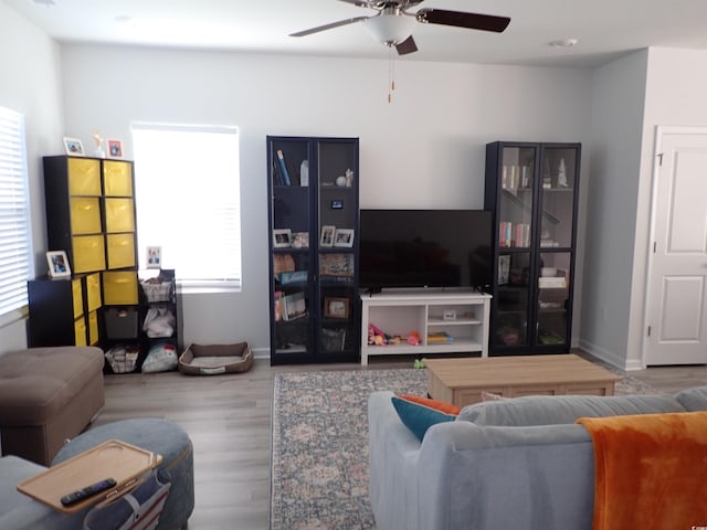 447 Archer Ct, Conway, SC 29526 - living room with wood finished floors, baseboards, and a ceiling fan