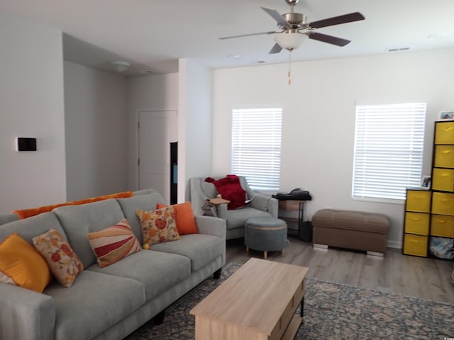 447 Archer Ct, Conway, SC 29526 - living area featuring wood finished floors, baseboards, a ceiling fan, and visible vents