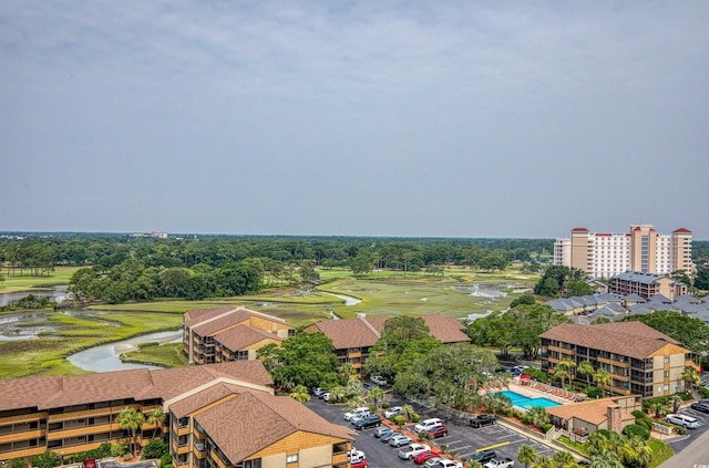 9550 Shore Dr Unit 1518, Myrtle Beach, SC 29572 - drone / aerial view of a nearby body of water, a golf club, and a pool area