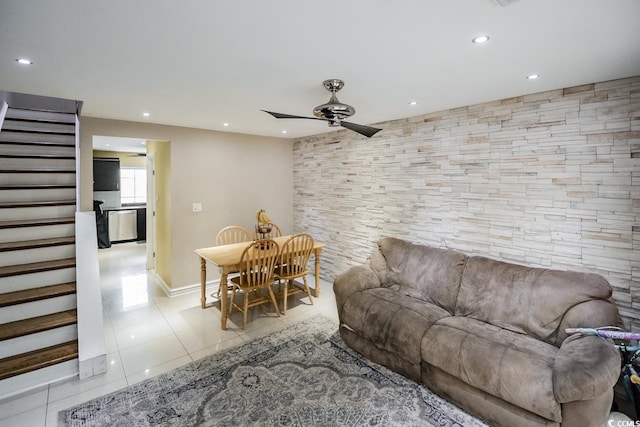 tiled living area with recessed lighting, stairs, and ceiling fan