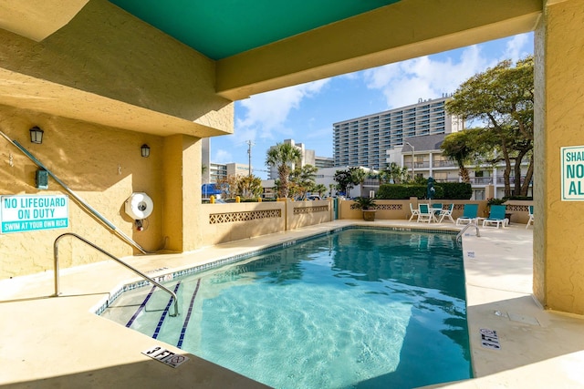 210 75th Ave N Unit 4030, Myrtle Beach, SC 29572 - community pool with a patio