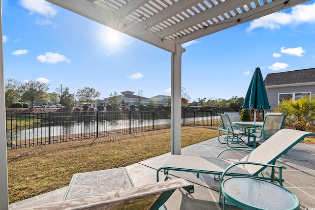 5885 Ledro Ln, Myrtle Beach, SC 29572 - fenced backyard with a patio area, a water view, and a pergola