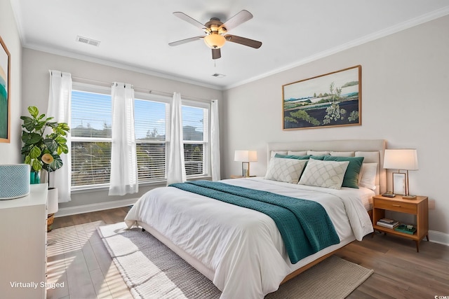 5885 Ledro Ln, Myrtle Beach, SC 29572 - bedroom featuring wood finished floors, ornamental molding, and ceiling fan