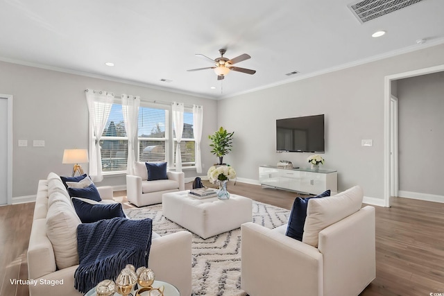 5885 Ledro Ln, Myrtle Beach, SC 29572 - living room featuring a ceiling fan, wood finished floors, recessed lighting, and ornamental molding