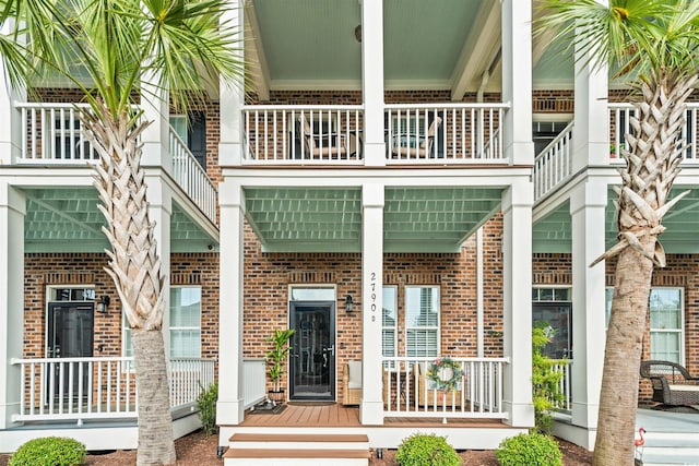 2790 Howard Ave Unit D, Myrtle Beach, SC 29577 - entrance to property featuring covered porch and brick siding