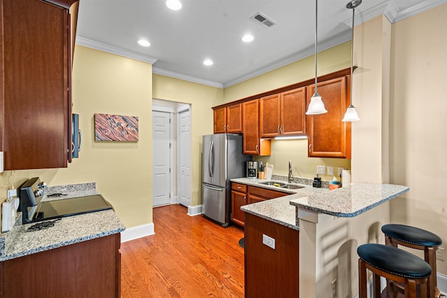 2790 Howard Ave Unit D, Myrtle Beach, SC 29577 - kitchen featuring freestanding refrigerator, electric range oven, crown molding, a sink, and a peninsula