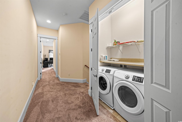 2790 Howard Ave Unit D, Myrtle Beach, SC 29577 - laundry room with washer and clothes dryer, light colored carpet, and baseboards