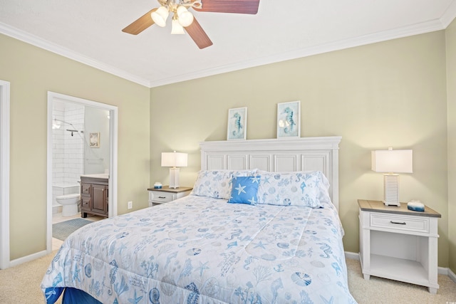 bedroom featuring crown molding, baseboards, and light carpet