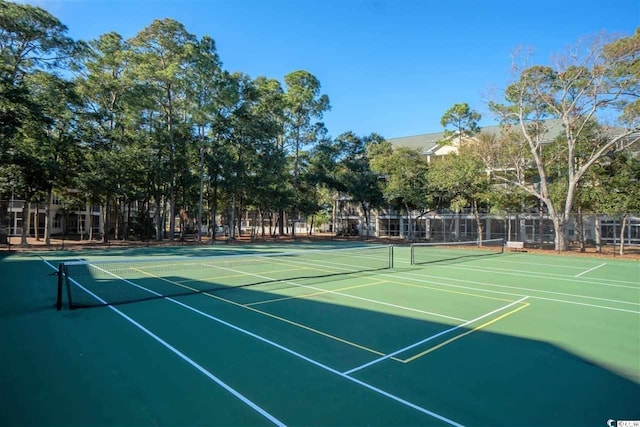 view of sport court featuring community basketball court and fence