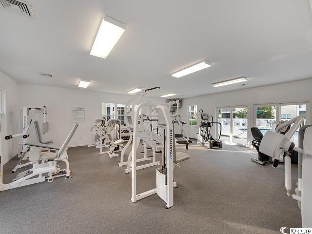 workout area featuring visible vents