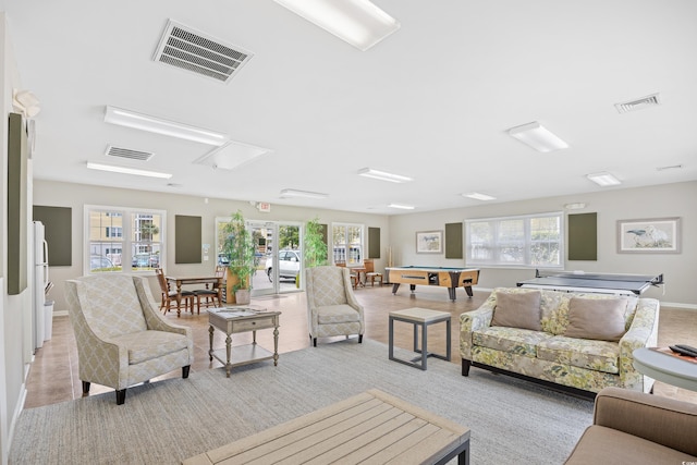 living room featuring visible vents, baseboards, and pool table