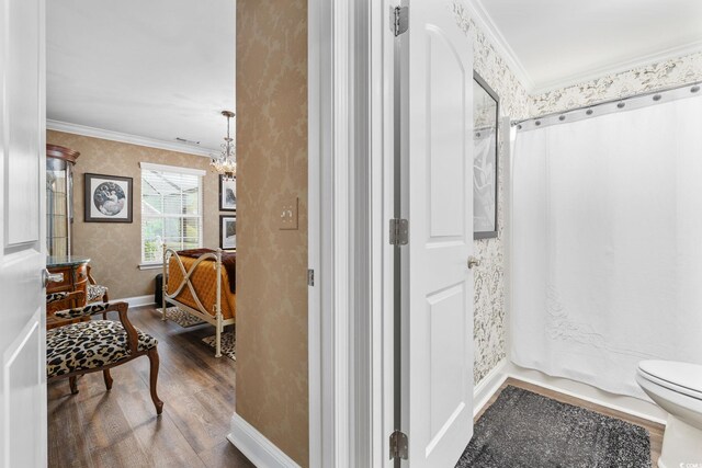 90 Carolina Crossing Blvd, Little River, SC 29566 - full bath featuring wallpapered walls, wood finished floors, connected bathroom, crown molding, and toilet