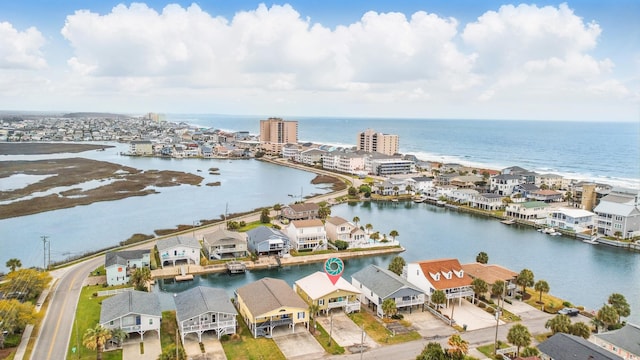 bird's eye view with a residential view and a water view
