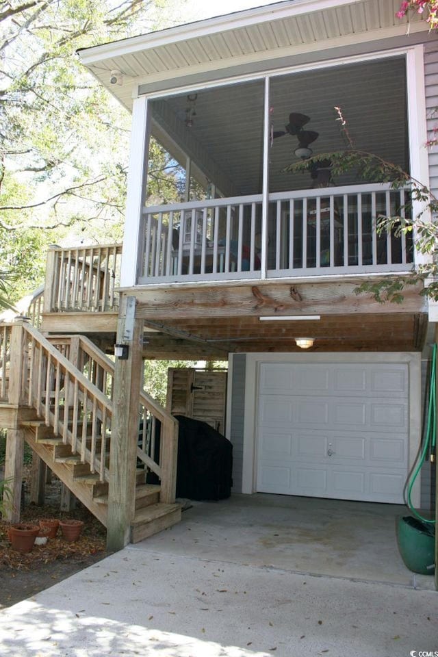 exterior space featuring an attached garage and concrete driveway