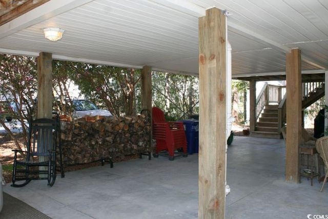 view of patio featuring stairway
