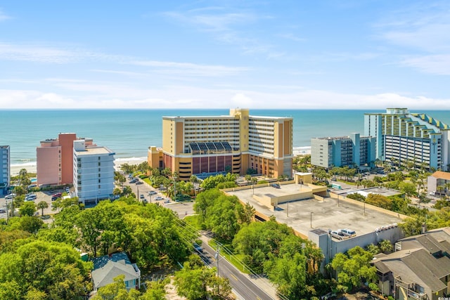 view of urban area featuring a nearby body of water