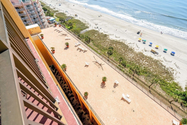 aerial view of waterfront with a beach