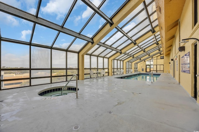 indoor pool with an in-ground hot tub
