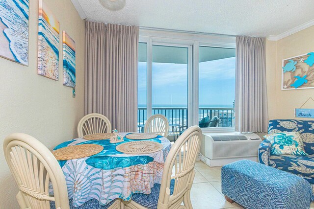 200 76th Ave N Unit 1211, Myrtle Beach, SC 29572 - dining area with crown molding, a textured ceiling, a water view, and tile patterned flooring
