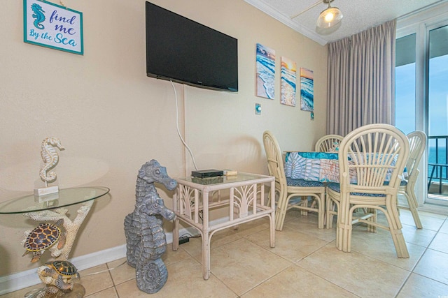 200 76th Ave N Unit 1211, Myrtle Beach, SC 29572 - dining room with crown molding, light tile patterned floors, and baseboards