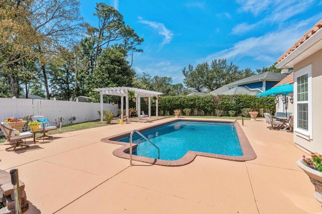 5628 Marion Cir, Myrtle Beach, SC 29577 - view of swimming pool with a pergola, a patio area, and a fenced backyard