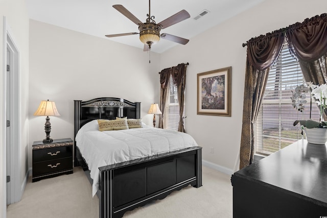 5628 Marion Cir, Myrtle Beach, SC 29577 - bedroom featuring light colored carpet, baseboards, and a ceiling fan