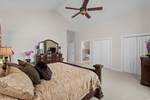 5628 Marion Cir, Myrtle Beach, SC 29577 - bedroom featuring high vaulted ceiling, multiple closets, light colored carpet, baseboards, and ensuite bathroom