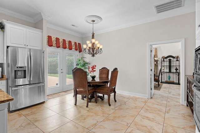 5628 Marion Cir, Myrtle Beach, SC 29577 - dining space featuring a chandelier, ornamental molding, and french doors