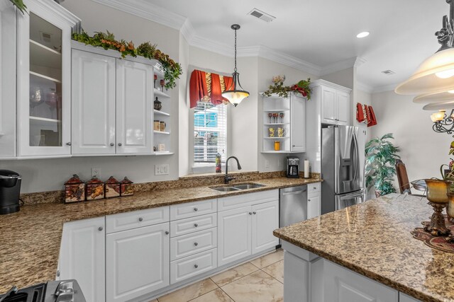 5628 Marion Cir, Myrtle Beach, SC 29577 - kitchen with open shelves, appliances with stainless steel finishes, a sink, white cabinets, and light marble finish flooring