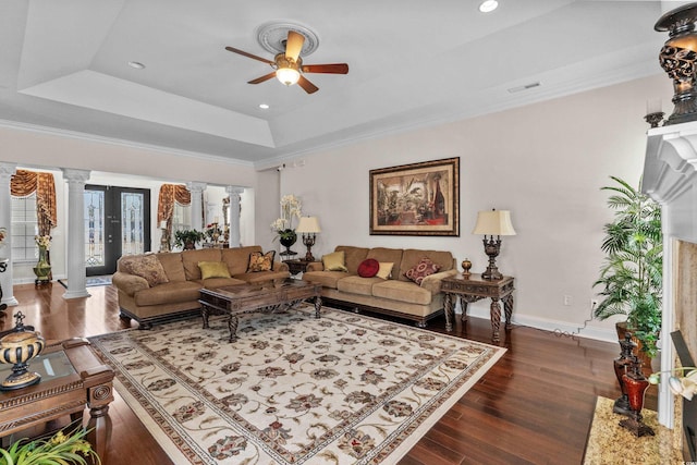 5628 Marion Cir, Myrtle Beach, SC 29577 - living area with a tray ceiling, decorative columns, a ceiling fan, wood finished floors, and baseboards