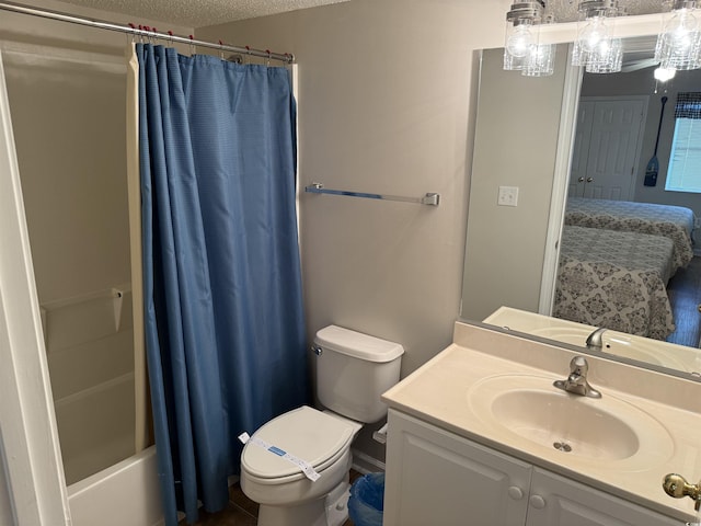 full bath featuring vanity, ensuite bath, a textured ceiling, toilet, and shower / bathtub combination with curtain