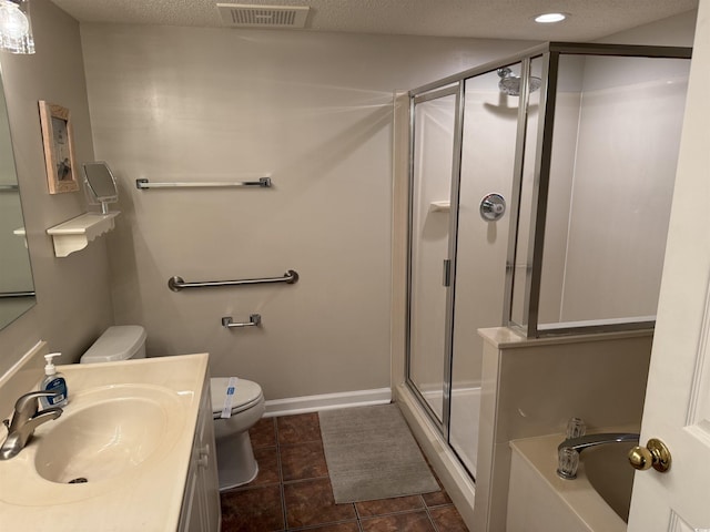 full bath with baseboards, a stall shower, toilet, visible vents, and a garden tub