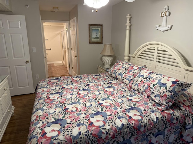 bedroom with wood finished floors