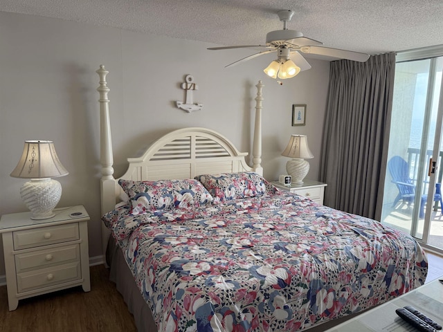 bedroom featuring access to outside, a textured ceiling, wood finished floors, and ceiling fan