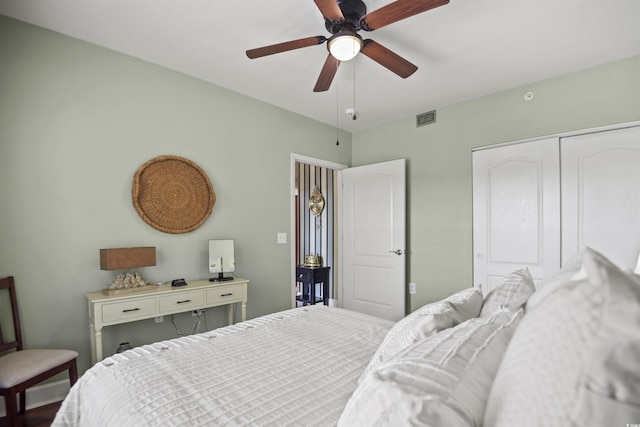 bedroom with a closet and a ceiling fan