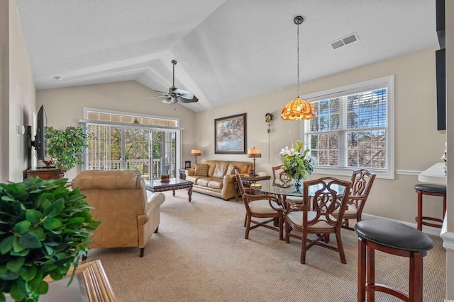 5751 Oyster Catcher Dr Unit 234, North Myrtle Beach, SC 29582 - living room featuring light carpet, a ceiling fan, and vaulted ceiling