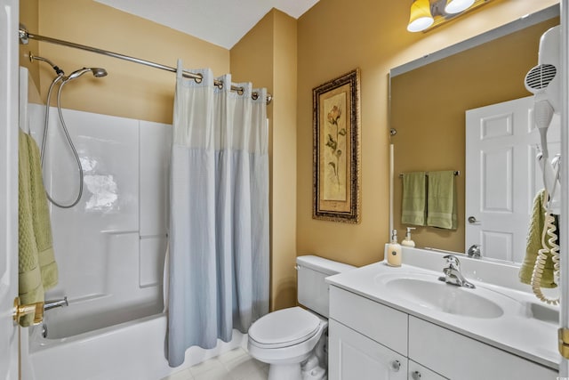 bathroom with toilet, shower / bath combo, and vanity