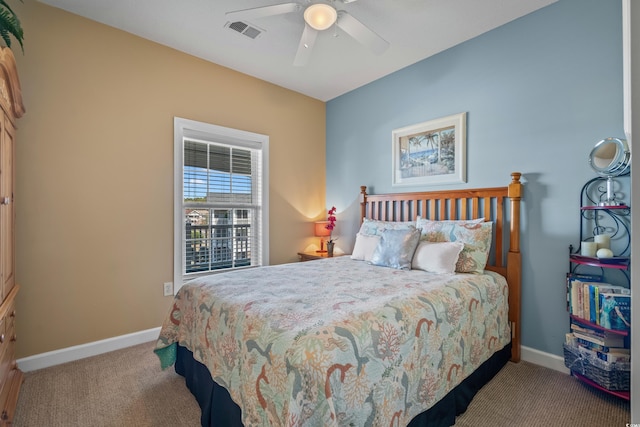 carpeted bedroom with baseboards and ceiling fan