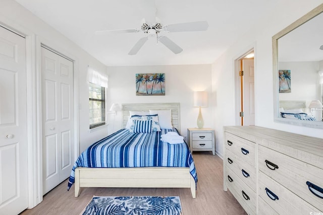 bedroom with wood finished floors and ceiling fan