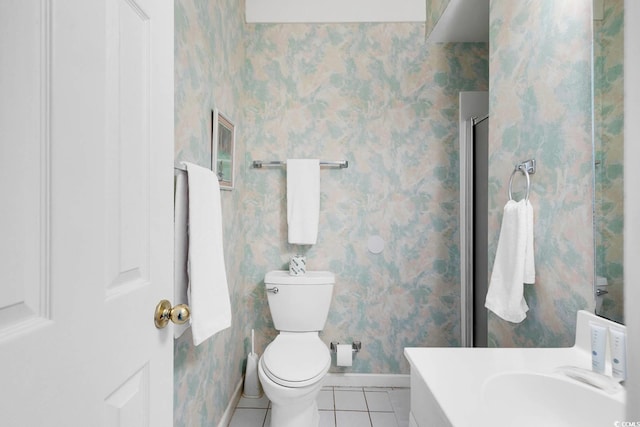 full bath with tile patterned floors and wallpapered walls