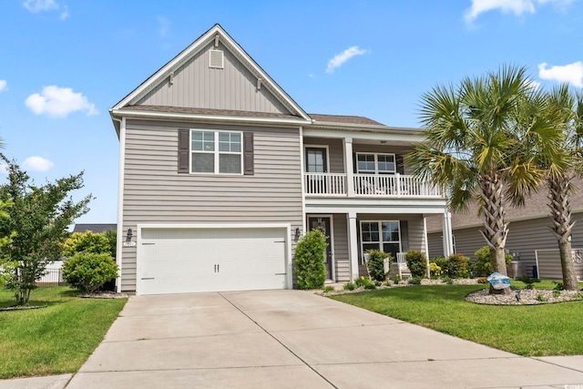 1101 Bronwyn Cir N, Myrtle Beach, SC 29582 - view of front of home with a balcony, a front yard, a garage, driveway, and board and batten siding